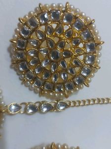 Golden Earrings And Mangtika Set.