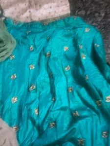 Teal Embellished Lehenga Choli