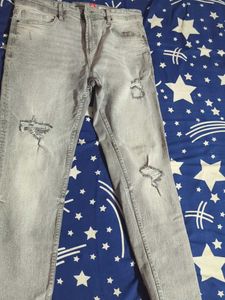 Ripped Grey Jeans