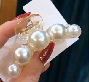 3 White Pearl Clutcher