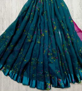 Graceful Teal Green Saree with Floral Design
