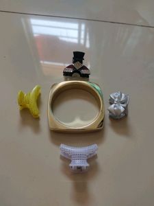 1 Kada, 4 Small Clutches, A Pair Of Earring.
