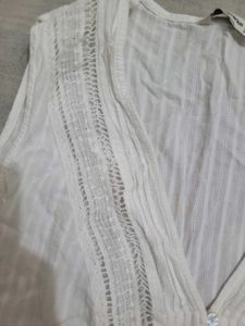White Sleeveless Top