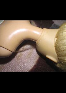 Two used barbie dolls