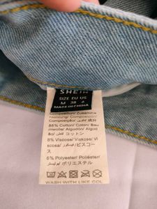 SHEIN Torn Denim Shorts