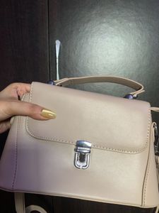 Nude Sling Bag With Silver
