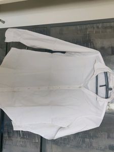 Solid white color formal shirt