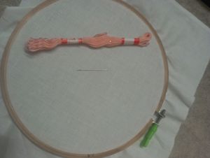 14 Inch Ring With 4 Needles And One Thread