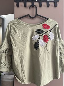 pretty applique work short top