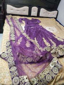 Purple Embroidered Lehenga with large size beautif
