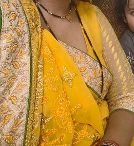 Women Embroidery Yellow Saree And Blouse