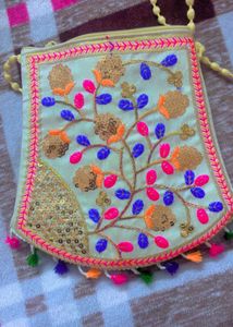Embroidered Sling Bag with Tassels