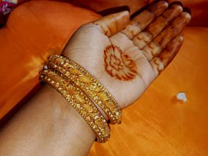 Golden Bangles With Stone Design