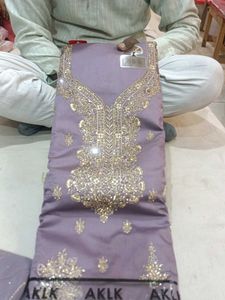 Embroidered dress material