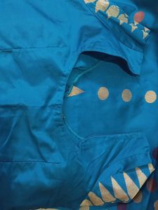 Uppada Pattu Teal Blue Saree with Gold Detail