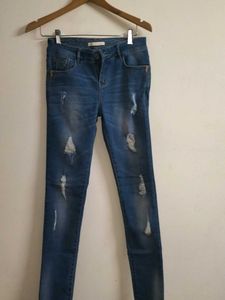 Distressed Denim Jeans
