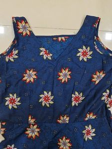 A Blue One Piece Dress