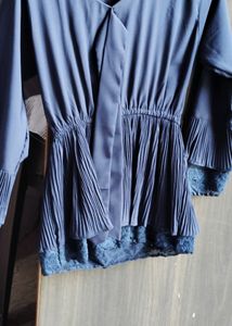 It Is A Very Good Looking Blue Colour Top And S