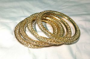 Sparkling Gold Bangles - Set of 4