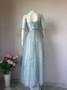 Soft tulle dusty blue gown