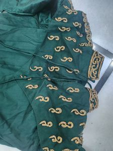 Luxurious Silk Dark Green Gown With Golden Stone