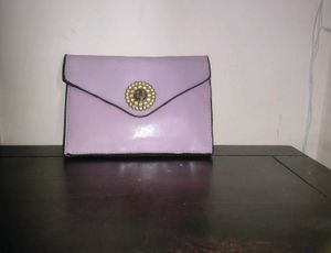 Sling Bag with Detachable Strap.