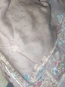 Unstitched Embroidered Dress Material