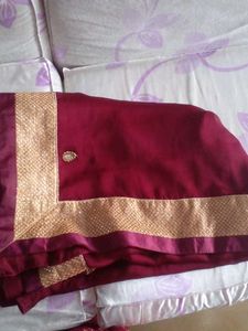 Elegant Maroon Saree with Gold Border