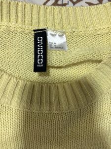 A butter yellow sweatshirt from H&amp;M