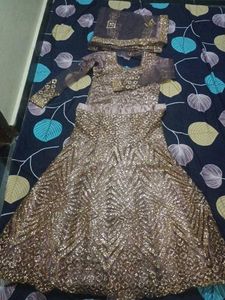 lehenga with small pipes like beads.