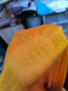 Yellow and brown new saree with intact blouse piec