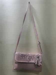 Chic Peach Clutch with Floral Detail