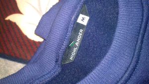 this is a nevy blue sweatshirt from highlander