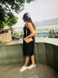 Black strapped one piece