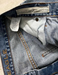 AMERICAN EAGLE LIGHT BLUE BOOTCUT JEANS 32