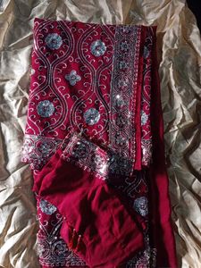 Elegant Maroon Embroidered Saree