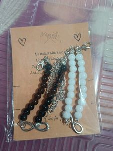 Infinity Bracelet And Black Stone Ring