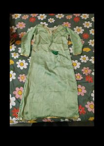 pretty pista green long kurti.