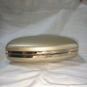 Golden Clutch Bag With Chain Sling Attachment