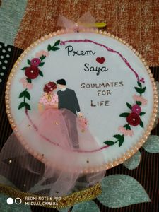 Beautiful customized couple hoop.