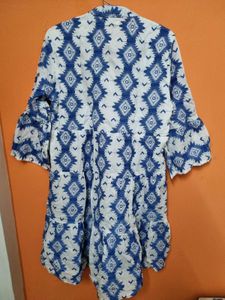 White Knee-Length One-Piece with Blue Embroidery