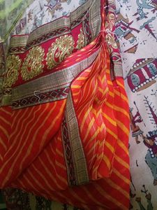 Orange Leheriya Saree with Embellished Border
