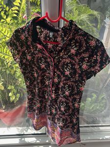 Floral Print Top bust is 18 inches