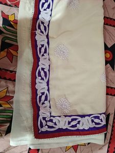 A Saree Half In Off White And rest Red
