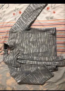 Off White Top, Black Cut Out With Glitter On I