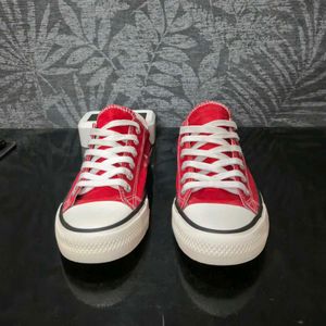 Red Low-Top Canvas Sneakers.