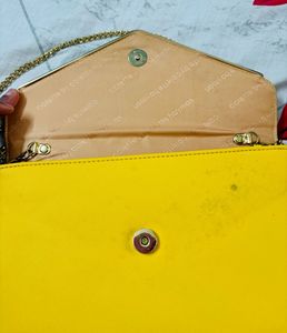 Yellow Color Collete Brand Clutch