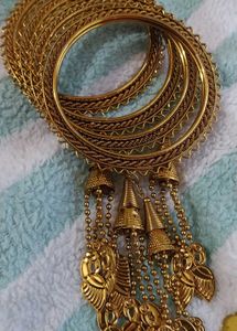 Traditional Gold-Tone Bangles with Jhumka & Leaf D