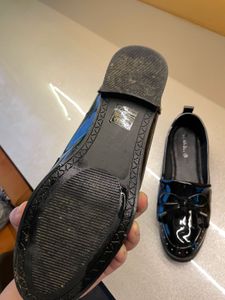 new bright shiny black westside loafers