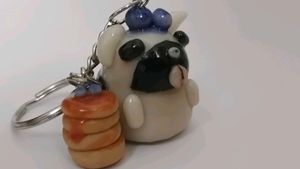Cute zebra striped pug and pancake keychain